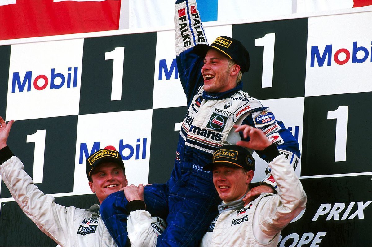 F1 1997 European GP Jerez Jacques Villeneuve Becomes World Champion Celebrates With Mika Häkkinen and David Coulthard