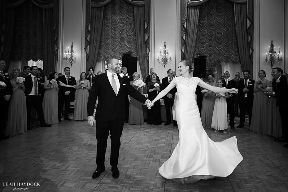 Black and white wedding picture of a first dance in the grand ballroom of the Taj Boston